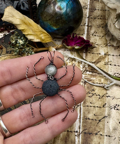 Large stone spider in copper