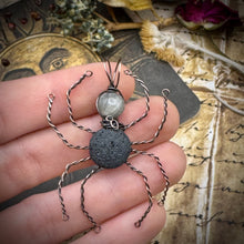Large stone spider in copper